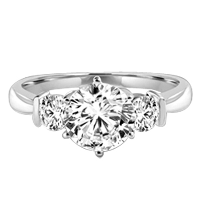 Platinum plated on sterling silver ring features a 2.0 ct. round cut Diamond Essence centerpiece rubbing elbows with two 0.3 round cut masterpices beside it. 2.6 cts. t.w. Breeding shows.