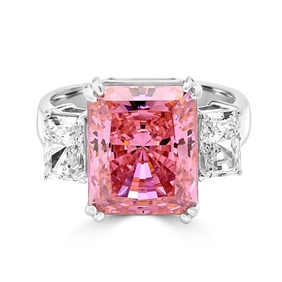 Pink Essence Ring—Emerald-cut 8-carat Pink Essence ring with Diamond Essence baguettes. 8.5 cts. T.W. set in Platinum Plated Sterling Silver.