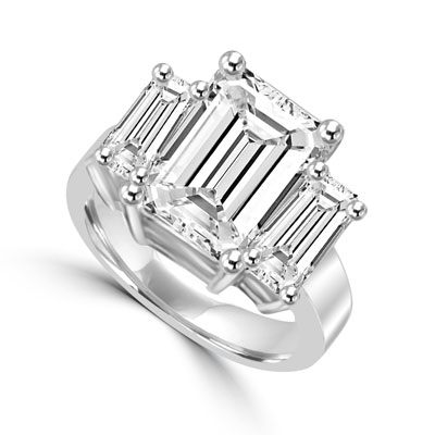 8 ct emerald cut diamond with side stones in silver ring