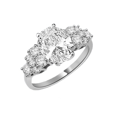 Designer Ring featuring a carefree display of 3.0 Cts. Oval Cut Diamond Essence Center Stone with the irresistible touch off six Round Brilliant Cut Masterpieces flashing temptingly on each side. 4.50 Cts.t.w.in Platinum Plated Sterling Silver.