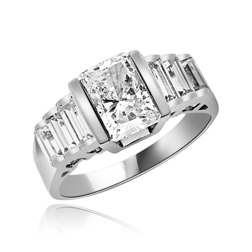 Great looking band with graduating baguettes on the band and 1.5 ct. radiant emerald Diamond Essence center, set in thick bar setting. 2.5 cts.t.w. in Platinum Plated Sterling Silver.