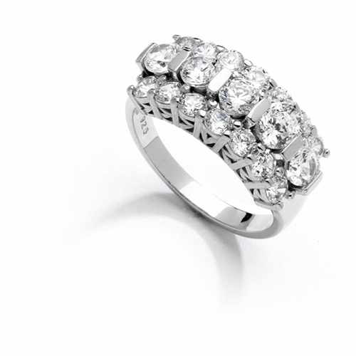 Wide Band Round Sparkles on Display - 2.5 Cts. T.W. In Platinum Plated Sterling Silver.