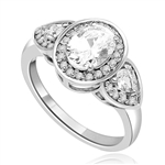 A remarkable combination Ring of 1.5 Ct Oval, 0.25 Ct Trillion and round Accents shows off a sparkle that is surefire hit! 2.5 cts. t.w. In Platinum Plated Sterling Silver.