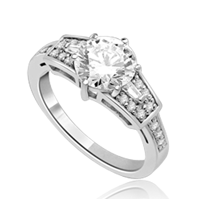 Mesmerizing 2.0 Ct Brilliant stone is adorned by superbly crafted Baguettes and Round Melee forming 2.5 Cts. T.W. In Platinum Plated Sterling Silver.