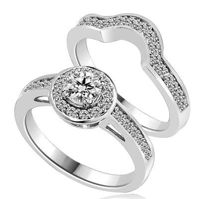 An attractive Wedding Set with 0.50 Ct. Round Brilliant Diamond Essence set in eight prong setting in center with Melee around and on band. The matching Band is curved in center, to fit with main Ring. 1.0 Cts. T.W. set in Platinum Plated Sterling Silver.