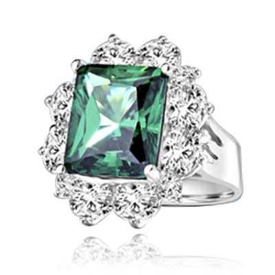 Gorgeous Green - 6.0 Cts. Emerald cut Emerald Essence in center surrounded by Oval cut Diamond Essence and Melee. 9.0 Cts T.W. set in Platinum Plated Sterling Silver.