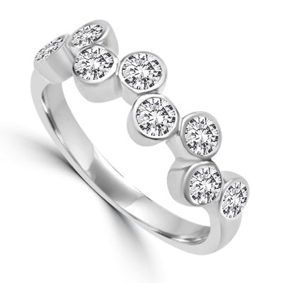 Diamond Essence Ring with 0.20 Ct. Each Round Brilliant Stone In Platinum Plated Sterling Silver ZigZag Bezel Setting.