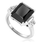 Onyx Ring - 6.0 Cts. Radiant Emerald cut Onyx Essence set in four prongs, accompanied by channel set Diamond Essence Baguettes and Princess cut stones on either side. 7.0 Cts.T.W. set in Platinum Plated Sterling Silver.