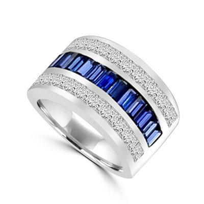 Sparkling Ring with three rows of Brilliance. Sapphire Essence Baguettes center is accentuated by Channel set Princess cut Diamond Essence Masterpieces. 5.0 cts.t.w. in Platinum Plated Sterling Silver.