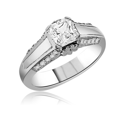 Solitaire Ring - 1.5 cts. Princess cut Diamond Essence in center with melee on sides of the band. In Platinum Plated Sterling Silver. Available in select Ring sizes.