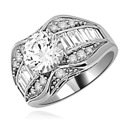 Designer Ring with 2.0 Cts. Round Diamond Essence in center, accompanied by Baguettes and Melee on band, 4.0 cts.t.w. set in Platinum Plated Sterling Silver. Available in select Ring sizes.