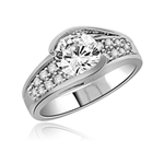 Designer Ring with 2.0 Cts. Round Diamond Essence in Center with Melee set on the band, in Platinum Plated Sterling Silver. Available in select Ring Sizes.