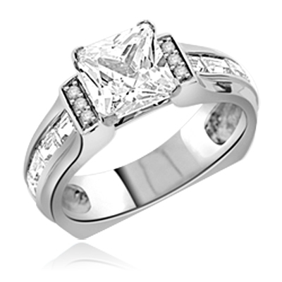 Designer Ring with 2.0 Cts. Princess Cut Diamond Essence in center and baguettes and melee on sides set in Platinum Plated Sterling Silver. Available in select Ring sizes.