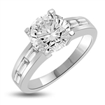Baguetted Beauty! 1.25 Cts. Round Brilliant Diamond Essence mounts on top pf elegant Baguettes on the band. Appx. 2.5 Cts. T.W.