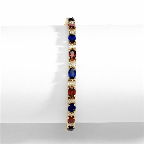 Perfect party wear. 7" long Diamond Essence Vermeil bracelet, in alternate setting of oval cut Sapphire Essence and Garnet Essence stones, 0.5 carat each in four prongs. Diamond Essence melee set in between for more dramatic look. 12 cts.t.w.