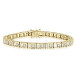 7" long stunning design bracelet with Diamond essence emerald cut baguettes and round brilliant Diamond Essence masterpieces set in ethnic setting of Gold Vermeil. Appx. 9.0 cts.t.w.