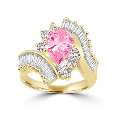 A beautiful designer ring. Diamond Essence Pink Pear cut stone of 2.5 carat supported by round brilliant melees and artistically curved shank with brilliant baguettes gives an extraordinary look and compliments. Must have one. 4.80 cts.T.W.