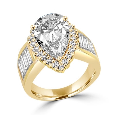 Mesmerizing ring with 4.0 cts. pear cut center, accents and baguettes  set in Gold Vermeil.