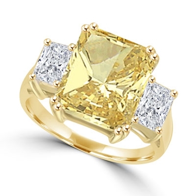 Gold ring with 7 ct emerald-cut canary stone and side baguettes