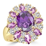 This designer ring is just perfect for party lovers to show-off. 3.0 ct. oval cut amethyst, surrounded by 8 small amethyst marquise,1.3 cts.and white round stones 0.80 cts. all around it, 5.10 cts T.W. set in 14KGold Vermeil.