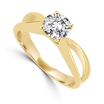 This Ring Is a sureshot hit with jewelry conossieurs. 0.75 Ct. Round Brilliant Masterpiece is set exquisitely on a cross curve band. In 14k Gold Vermeil.