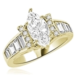 Diamond Essence Designer Ring With Marquise cut Diamond Essence, 1.50 Cts set in six prongs and Diamond Essence Melee on two sides on curved bars,The band is enhanced with Diamond Essence baguettes, 3.50 Cts.T.W. in 14k Gold Vermeil.