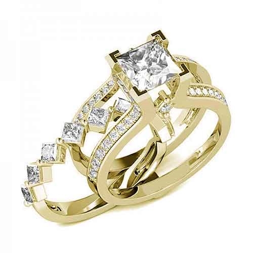 Diamond Essence Designer Wedding set with insertable wedding ring of 0.10 ct. each princess melee. Main band with 2 carat Princess cut center and round melee on the band. Beautiful wedding set with 3.5 Cts.t.w. in Gold Vermeil.