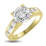 Baguetted Beauty! 1.25 Cts. Round Brilliant Diamond Essence mounts on top pf elegant Baguettes on the band. Appx. 2.5 Cts. T.W. set in 14K Gold Vermeil.