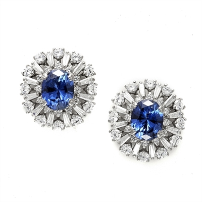 Diamond Essence Designer Earrings with 2.5  carat  Oval Sapphire Essence  in the center, surrounded by  Diamond Essence round stones and baguettes. Appx. 9.0 cts.t.w. Just perfect for all occasions. In 14k Solid White Gold.