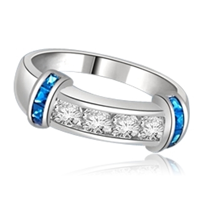 Brilliant channel-set Diamond Essence diamonds with a bar of Princess cut Sapphire  Essence on either side. 1.35 cts. T.W. set in 14K Solid White Gold.