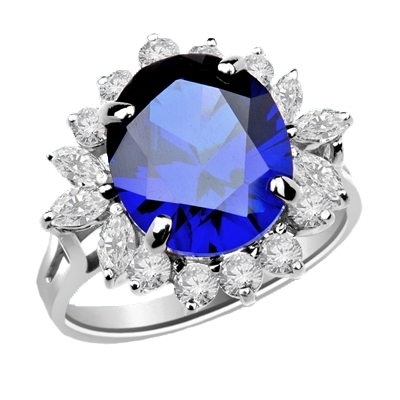Amazingly beautiful Ring with White Brilliant Marquise and Round accents surrounding a 5 Ct. Blue Star Sapphire Cabochan Center, which in light will revel a Star! . 14K Solid White Gold.