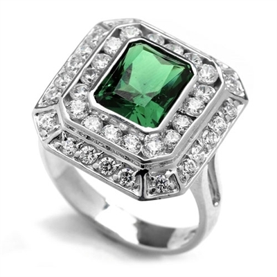 Diamond Essence Cocktail Ring With 2.50 Cts. Emerald Essence Radiant Emerald In Center Round Melee Around It, 4.50 Cts.T.W. In 14K White Gold.