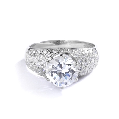 Heirloom - Brilliant Ring with 3 Cts. Round Diamond Essence Store atoning a fanfare band of Pave Set Melee Stones on each side. 3.25 Cts. T.W. set in 14K Solid White Gold.