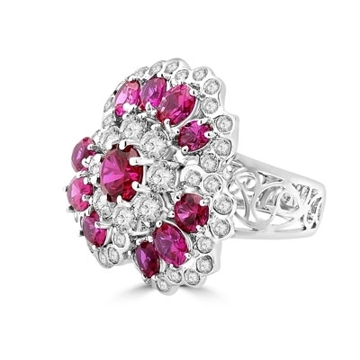 A beautiful ring in floral design. Diamond Essence ruby and round brilliant masterpieces.5.0 cts. T.W. set in 14K Solid White Gold. A perfect party wear to get compliments.