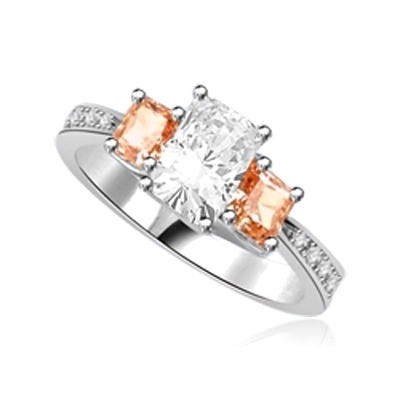 Ring-emerald cut stone with champagne baguettes