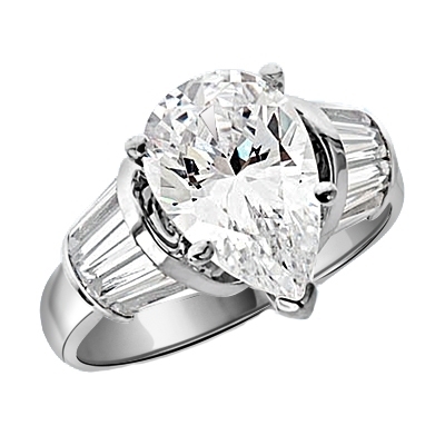 Majestic Pear cut Diamond Essence ring. 3 carat Pear center encircled by baguettes accents on either side. 5.0 cts.t.w. in 14K Solid White Gold.
