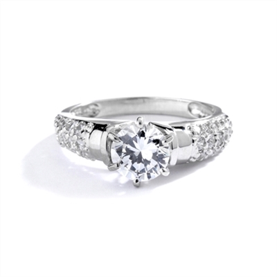 Engagement Ring- Tiffany set, 1.0 Ct Round Brilliant Diamond Essence in center with cluster of sparkling Melee on the band. 1.25 Cts T.W. set in 14K Solid White Gold.