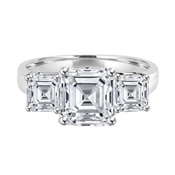 Three Stone Ring - 3.0 Carat Asscher Cut Diamond Essence Stone in the center and 0.5 carats Asscher  Cut Diamond Essence stones on each side.4.0 cts. t.w.
&#8203;