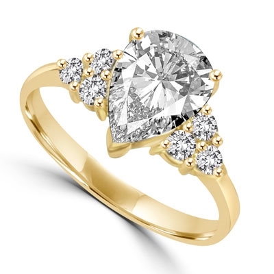 Blinding Beauty - She'll adore this outsized 2 Ct. Pear Shaped white Brilliant Diamond Essence masterpiece set with 3 dazzling round stones on either side of the band. Outstanding value for 2.30 Cts. T.W. in Gold Vermeil.