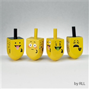 Bright yellow painted wooden dreidels with emoji faces!