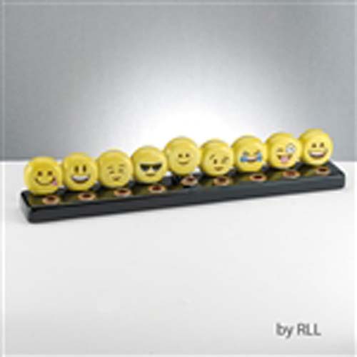 Bright yellow hand-painted ceramic menorah that winks and smiles!