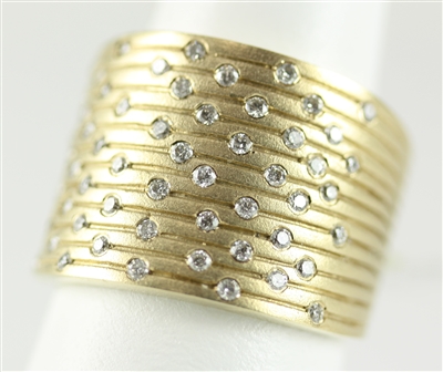 Textured wide gold tapered band with 1/2ct total weight of  diamonds in 14K yellow gold.