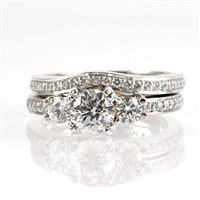 Round wedding set with 1 carat center diamond 18K