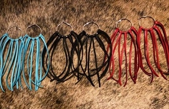Silver hoop with long deerskin leather earring