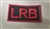 LRB Red on Black 1 1/2" x 3"