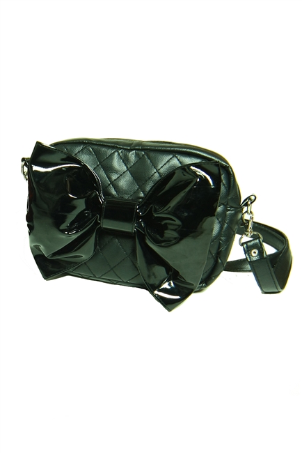 This beautiful vegan leather purse features a big black PVC bow.It also has a long removable strap. This purse will complement any Costume or outfit. Gothic inspired.