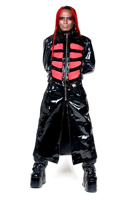 This Full Length Trench Coat in Black Heavy PVC with Cotton Side Panels

has a Fully Quilted Lining, Adjustable Side Buckle Straps, Zipper Closure

and Hips Front Pockets.