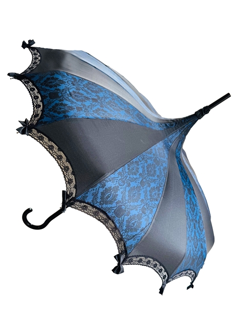 This beautiful umbrella has a POTIONS AND SPELLS DAMASK BLUE pattern. And features lace and bow details and hook-style handle.