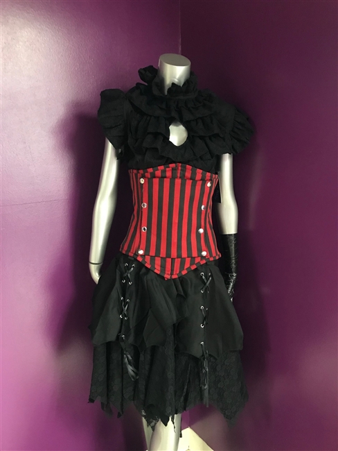 Vamp Waist Cincher is done in our Red and Black Striped fabric and has a
snap on panel on the front. This corset Features Back lacing, Front busk
closures, a privacy panel, and has steel coil boning.