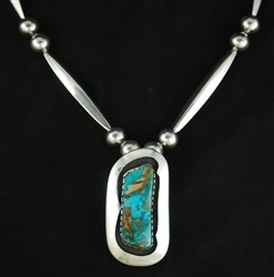 JOE H. QUINTANA TURQUOISE PIN/PENDANT WITH BEADS